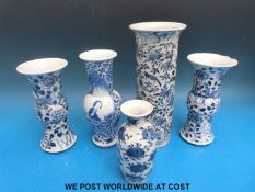 A pair of Chinese blue and white Gu vases,