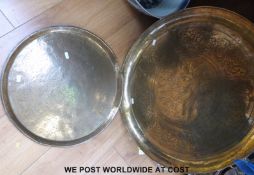 Two large brass trays engraved with human figures, animals, gods, goddesses etc,