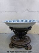 A Chinese large blue and white charger decorated with floral and foliate design on large bronzed