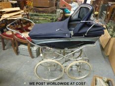A Silver Cross pram in blue