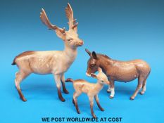 A Beswick deer and donkey