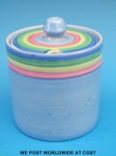 A Clarice Cliff Bizzare jam pot with red,