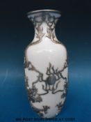 A Chinese white metal mounted vase with dragon decoration (17.