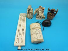 A Chinese bone inro, two wooden netsukes,