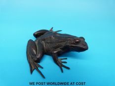 A bronze model of a frog,