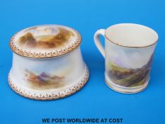 A Royal Worcester circular lidded box, the lid hand painted with a castle in landscape by Rushton,