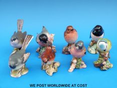 Eight Beswick garden bird models
