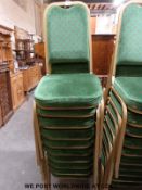 Approximately 30 stacking chairs.