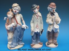 Three Lladro clown figures (22cm tall)