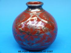 A Richard Ginori vase with silver lustre floral decoration (9cm tall)