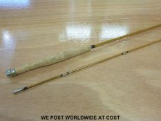 A Marcus Warwick split cane 'Riser' fly rod 8' long and AFTM 5 with cloth bag and aluminium tube
