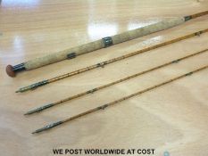 An Army & Navy 13' split cane rod with an extra top section