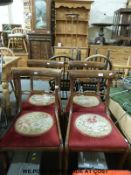 A set of four Regency style dining chairs