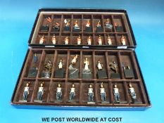 A diecast chess set featuring Napoleonic style figures,