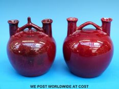 Two Royal Doulton or Bernard Moore flambé gourd vases, the darker example with faint signature,