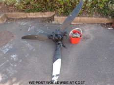 A Hartzell three bladed variable pitch aircraft propeller (diameter approximately 204cm)