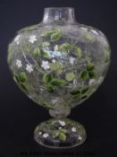 Probably Moser enamelled glass vase of bulbous form on pedestal foot decorated with wild alpine