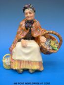 A Royal Doulton figure 'Old Lavender Seller' HN 1571