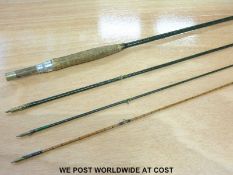 A Hardy split cane rod in a green finish