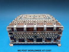 An Anglo-Indian tortoiseshell and bone box of Vizagapatam design with pierced and carved panels,