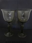 A pair of hand blown glass goblets with green tint (30cm tall,