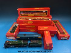 A collection of boxed Hornby locomotives and rolling stock includes Evening Star,