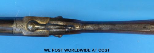 James Purdey & Sons 16 bore side by side hammer action shotgun with all over scrolling engraving,