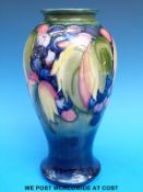 A Moorcroft pedestal vase decorated in the Leaf and Berry pattern, c1930's,