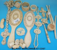 A large collection of European carved ivory and bone including a deeply carved crucifix decorated