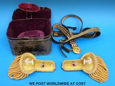 A cased pair of Victorian naval epaulettes in original Matthews & Co Outfitters,