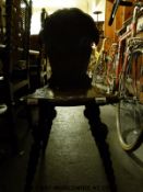 A finely carved Moorish or similar 19th / early 20thC chair with turned legs