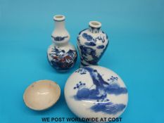 Two Chinese blue and white miniature vases, one with four character mark to the base,