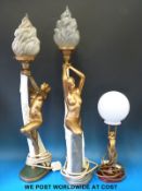 Two Art Deco style lamps formed as nudes holding flaming globes aloft (height of each