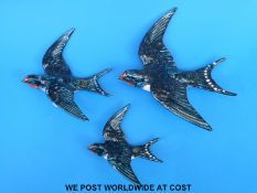 A set of three Beswick graduated swallow wall plaques