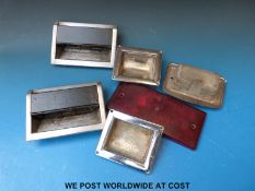 A collection of bus and coach ashtrays etc