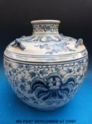 A Chinese blue & white jarlet of globular form with small ring handles decorated with stylised