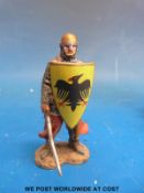 A collection of knights on horseback.