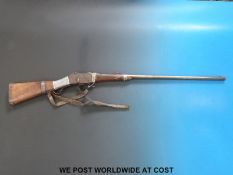 An Afghan or Indian Martini Henry rifle decorated with engraved white metal banding,