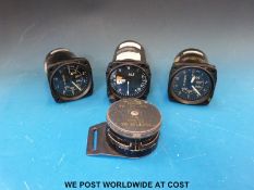 Three aircraft gauges comprising altimeter and two airspeed indicators together with a buckle