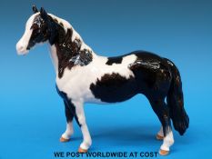 A Beswick piebald pinto pony