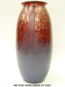 A large glass vase, probably Monart,