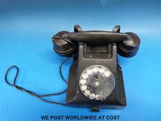 A black bakelite vintage phone