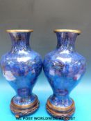 A pair of blue Chinese pedestal cloisonné vases on stands (34.