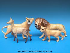 A Beswick lion family and a Beswick fawn