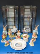 A large collection of storybook figures including Beswick,