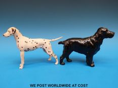 A Beswick spaniel and a ceramic dalmation