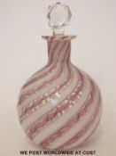 A glass scent bottle with spiralling white bands interspersed with pink ribbon style and aventurine