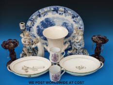 A German figural candlestick, Enoch Wood Village Scenes meat plate, Victorian drop lustres,