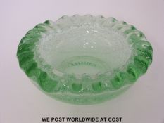 Daum Nancy green glass control bubble bowl with wavy rim, 17cm in diameter.
