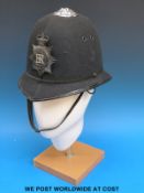 A Gloucestershire Constabulary policeman's helmet badged for Queen Elizabeth II